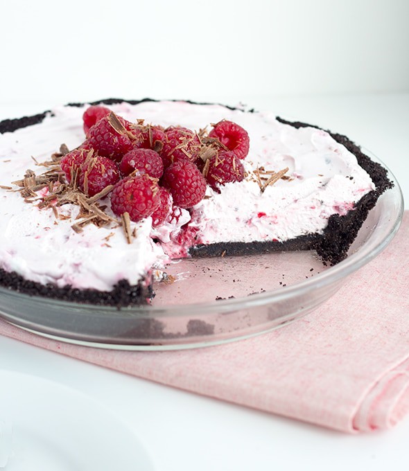 fresh Raspberry Cream Pie with slices missing