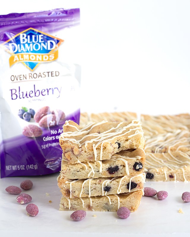 Blueberry Almond Shortbread Bars - buttery shortbread bars full of dried wild blueberries, chopped blueberry almonds and almond paste. The perfect chewy bar.