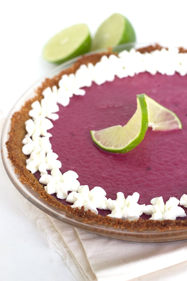 Blackberry Key Lime Pie - Sweet and Tart Twist on a classic Key Lime Pie. It's creamy and gorgeous to look at.