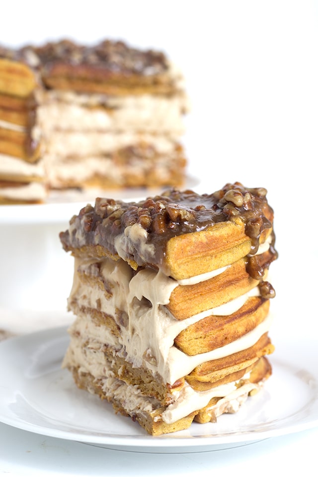 Pumpkin Pie Waffle Cake with a butter pecan glaze - spicy pumpkin waffles that are filled with a maple buttercream and topped with a butter bourbon pecan glaze. 