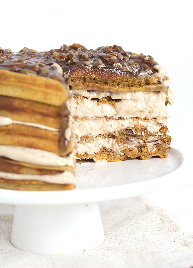 Pumpkin Pie Waffle Cake with a butter pecan glaze - spicy pumpkin waffles that are filled with a maple buttercream and topped with a butter bourbon pecan glaze. 