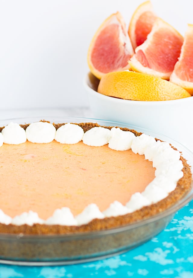 Grapefruit Pie garnished with dollops of whipped cream