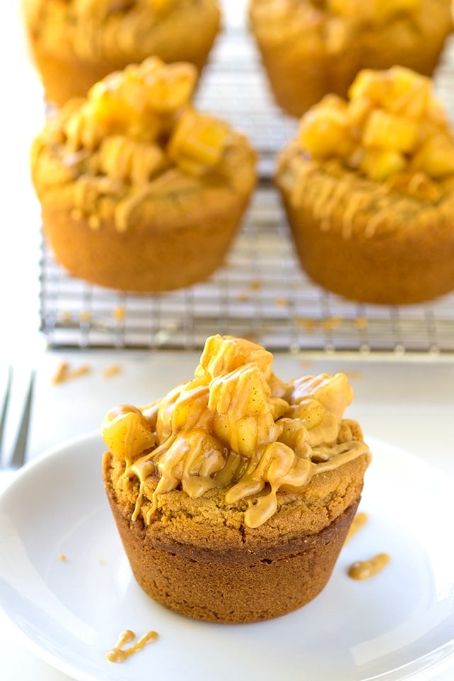 Apple Pie Peanut Butter Cookie Cups - peanut butter cookies baked inside cupcake tins and then stuffed with apple pie filling!
