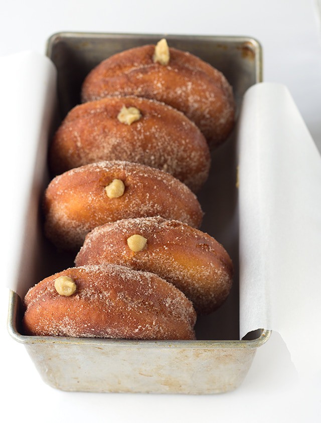 Coffee Custard Filled Donuts - Deep fried donuts filled with a sweet coffee custard. These donuts make the most irresistible breakfast and dessert!