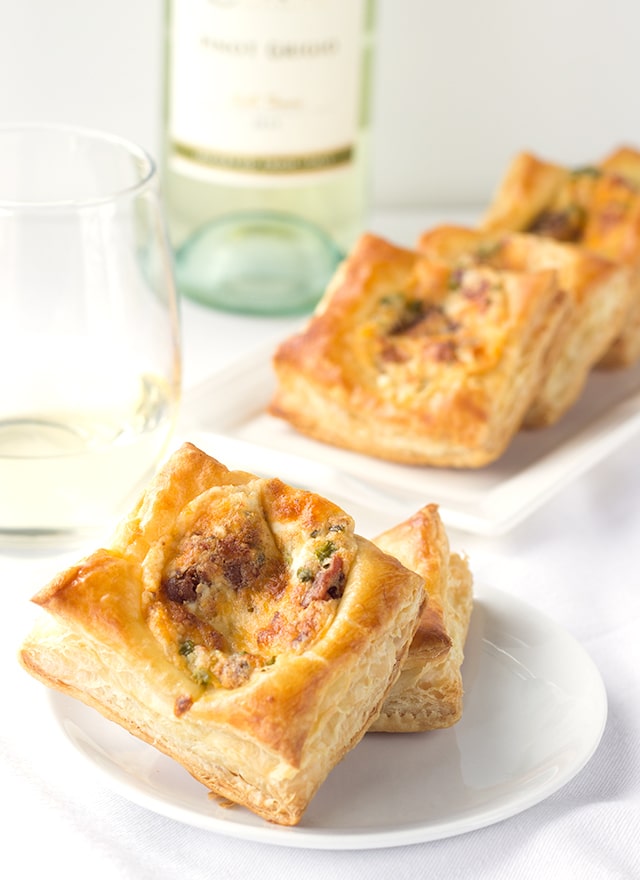 Jalapeno Popper Bites - a delicious appetizer with golden puff pastry loaded with jalapenos, pepper jack and cheddar cheese, and loads of bacon.