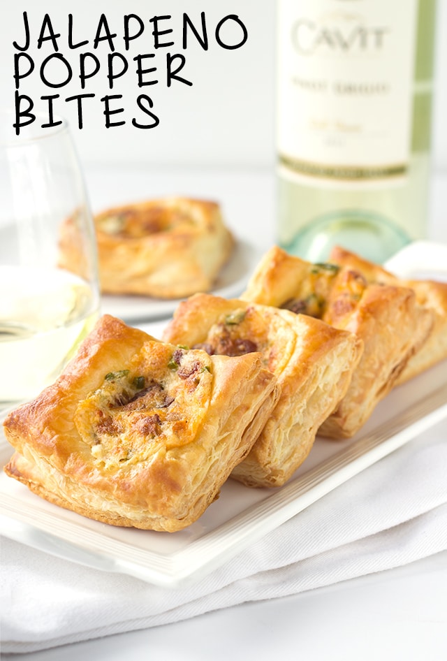 Jalapeno Popper Bites - a delicious appetizer with golden puff pastry loaded with jalapenos, pepper jack and cheddar cheese, and loads of bacon. 