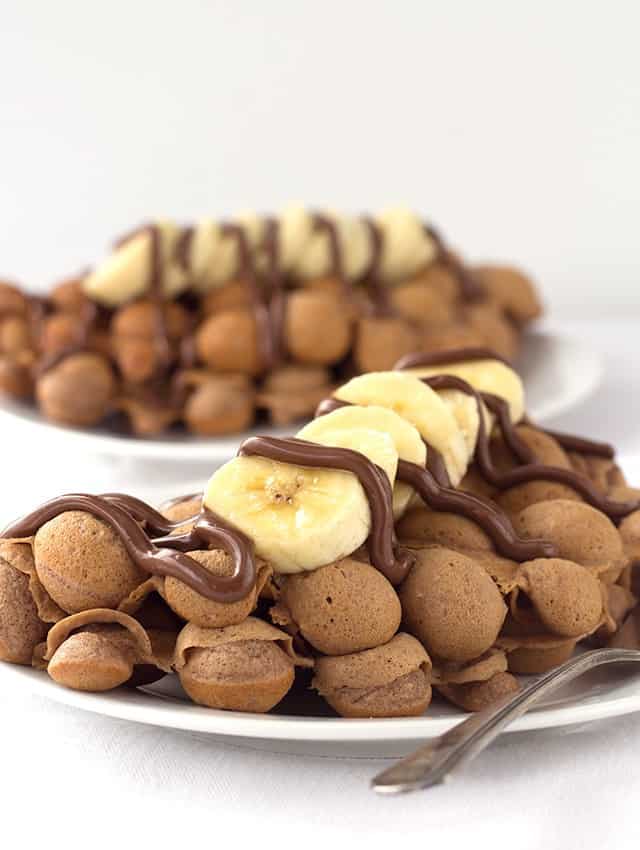 Nutella Bubble Waffles - nutella bubble waffles made in a egg waffle pan and topped with bananas and nutella!