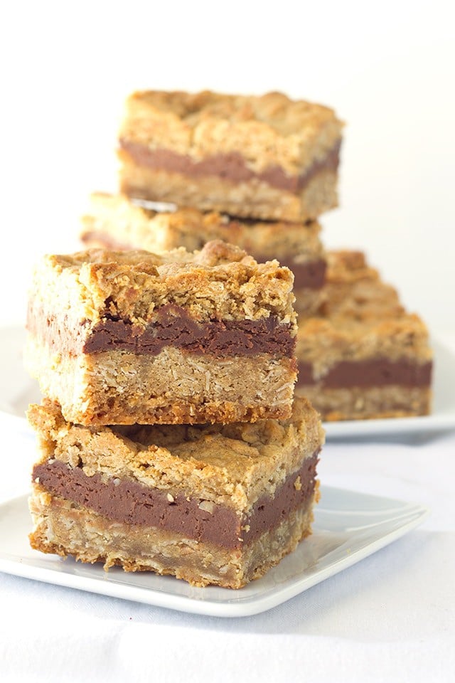 Chocolate Peanut Butter Oatmeal Bars - oatmeal bars made from peanut butter oatmeal cookie dough with a chocolate cheesecake filling in the middle!